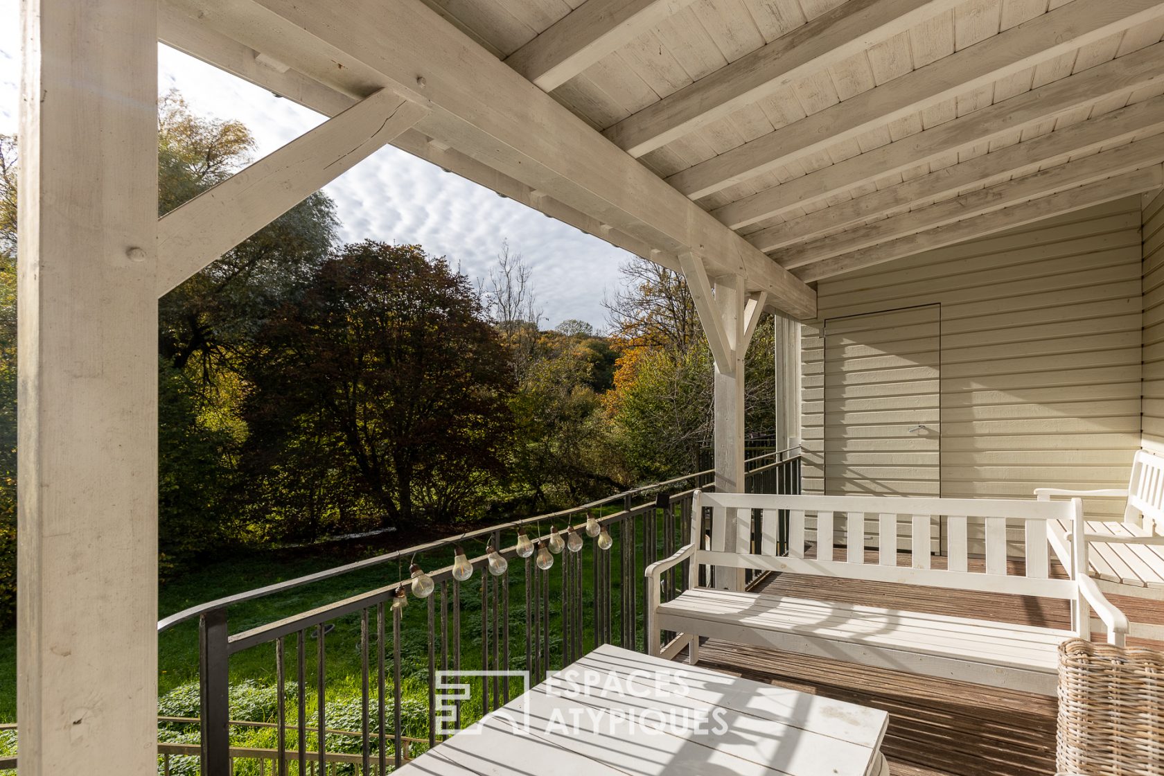 Charming mill and its verdant grounds