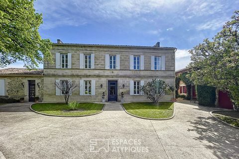 Stone mansion with swimming pool and outbuilding