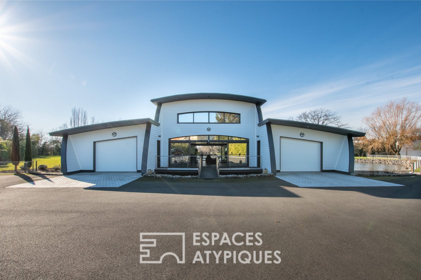 Architect-designed house on the water with indoor pool