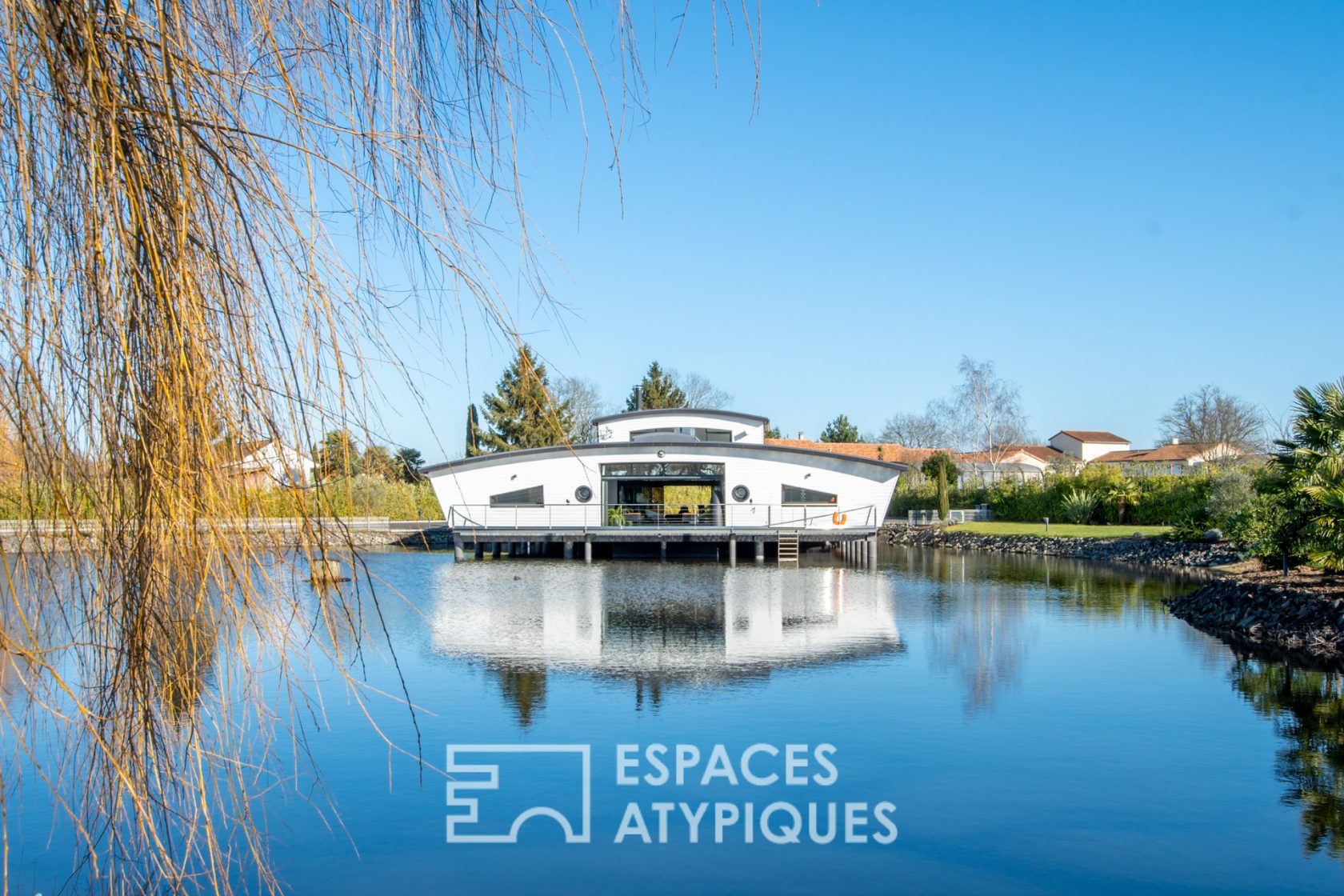 Architect-designed house on the water with indoor pool