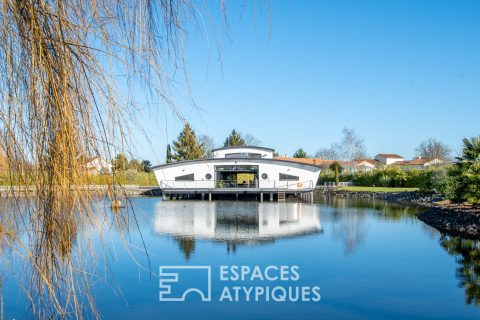 Architect-designed house on the water with indoor pool