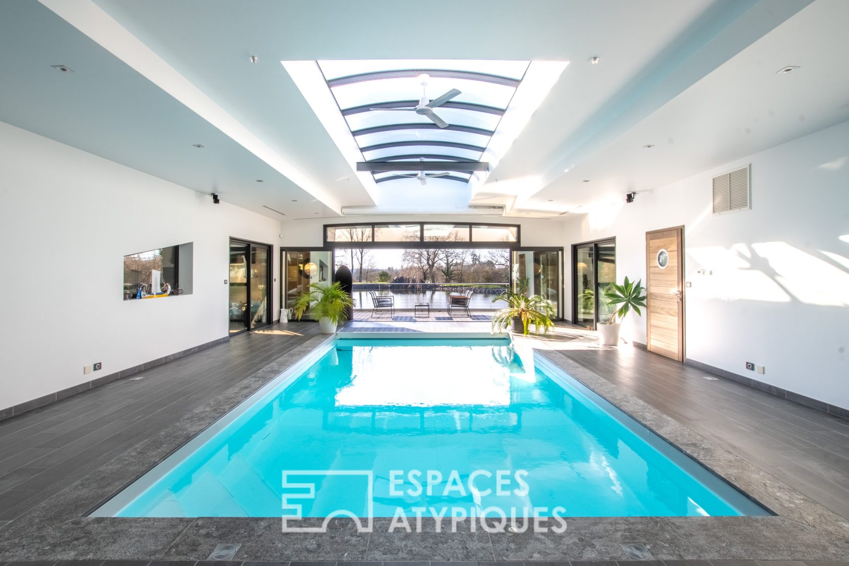 Architect-designed house on the water with indoor pool