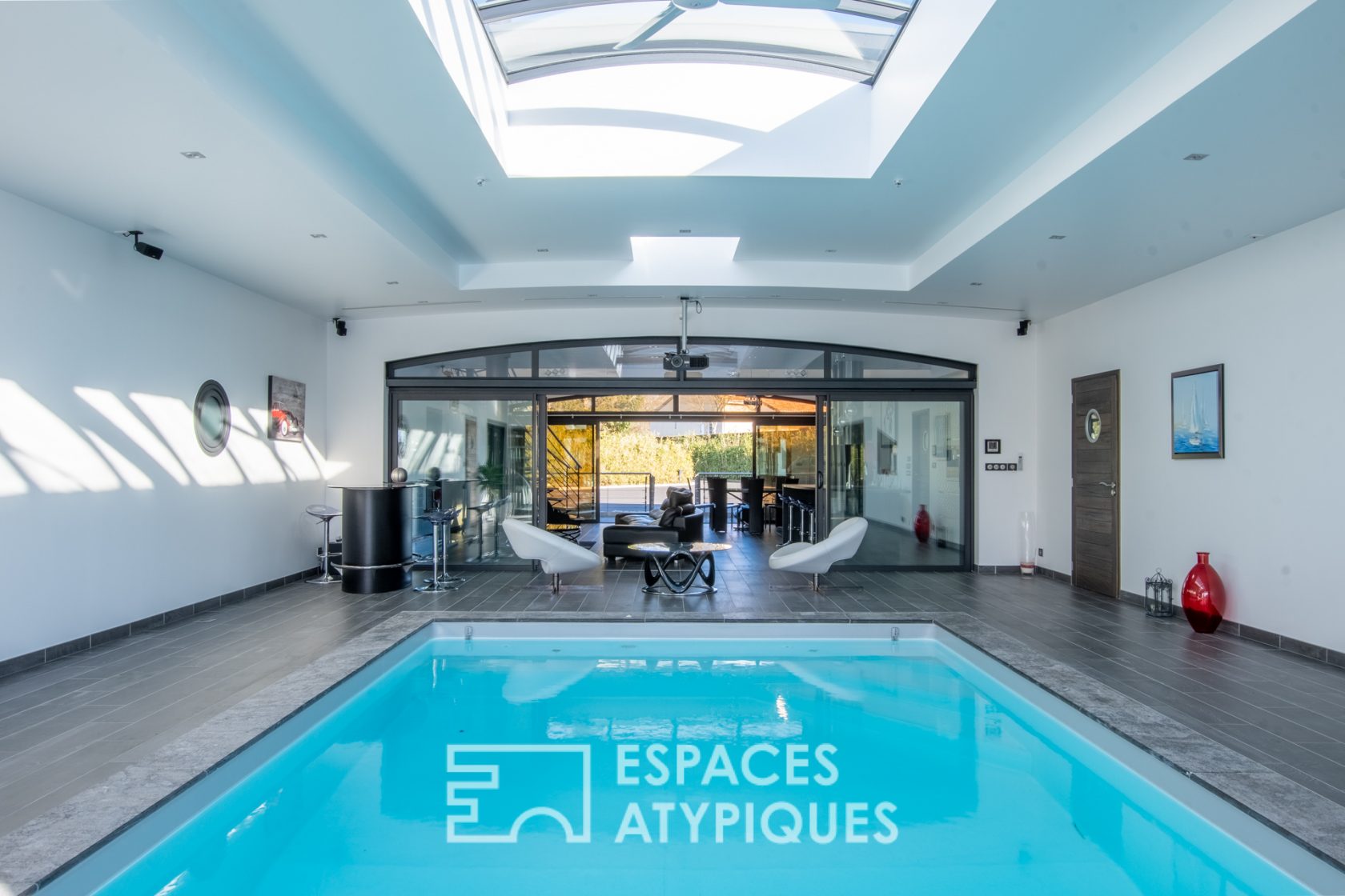 Architect-designed house on the water with indoor pool