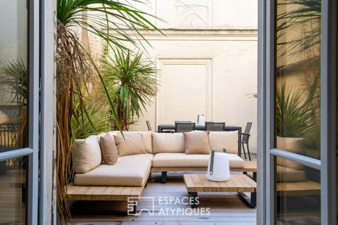 Ancien atelier rénové en duplex esprit loft avec terrasse – Marché Cadet