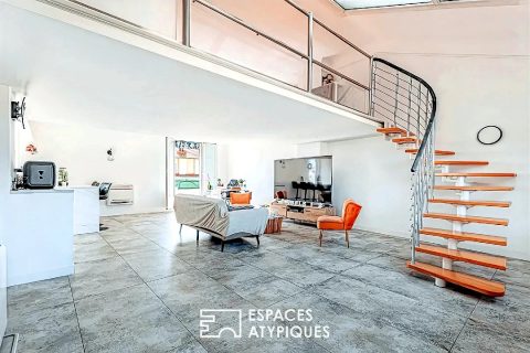 Loft d’exception situé au dernier étage avec extérieur