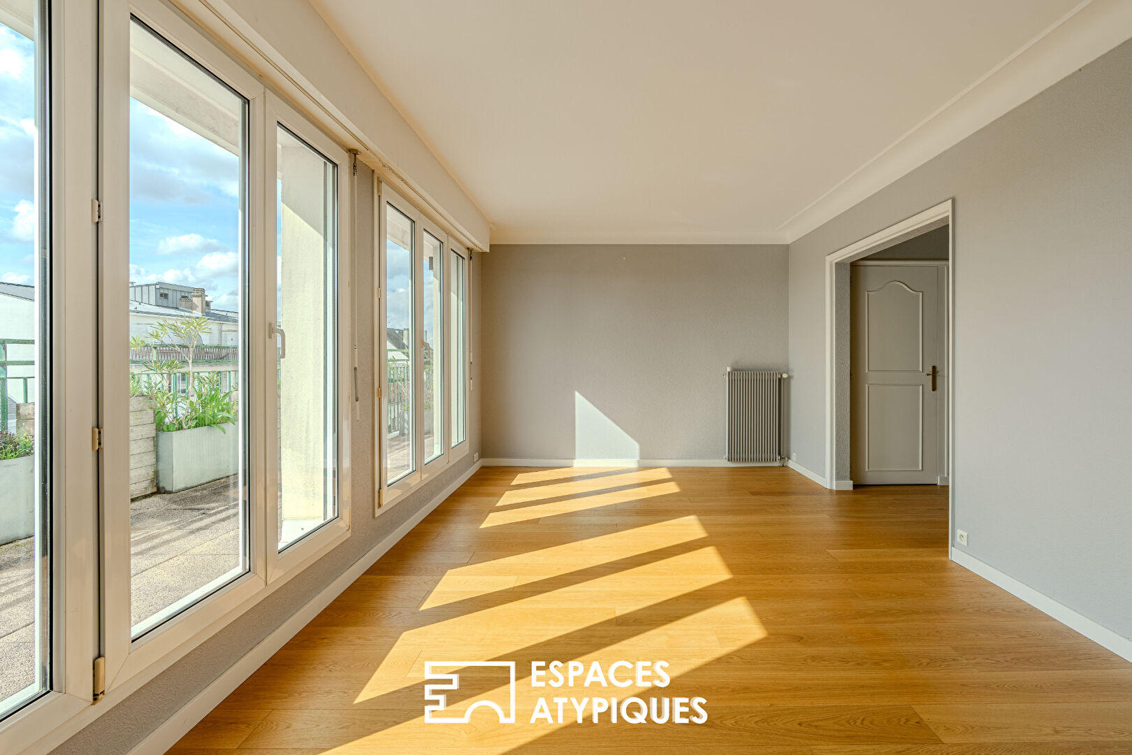 Procé- Hauts-Pavés Appartement dernier étage de 86 m2 avec terrasse et place de stationnement