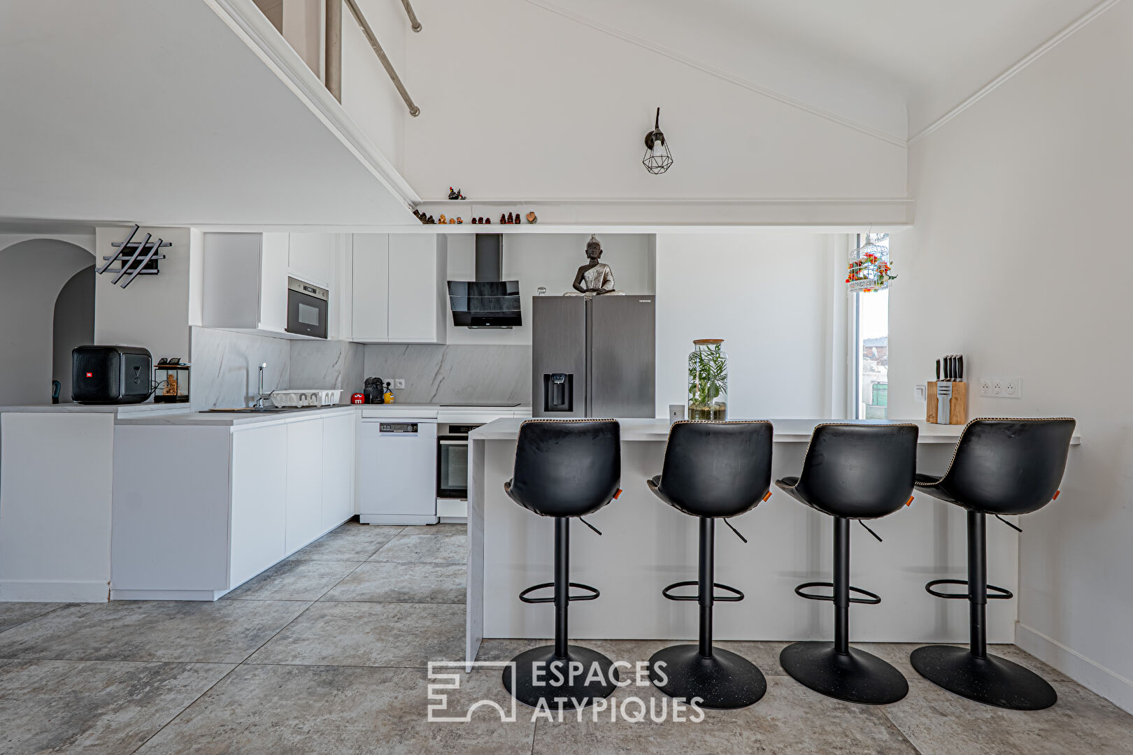 Loft d’exception situé au dernier étage avec extérieur