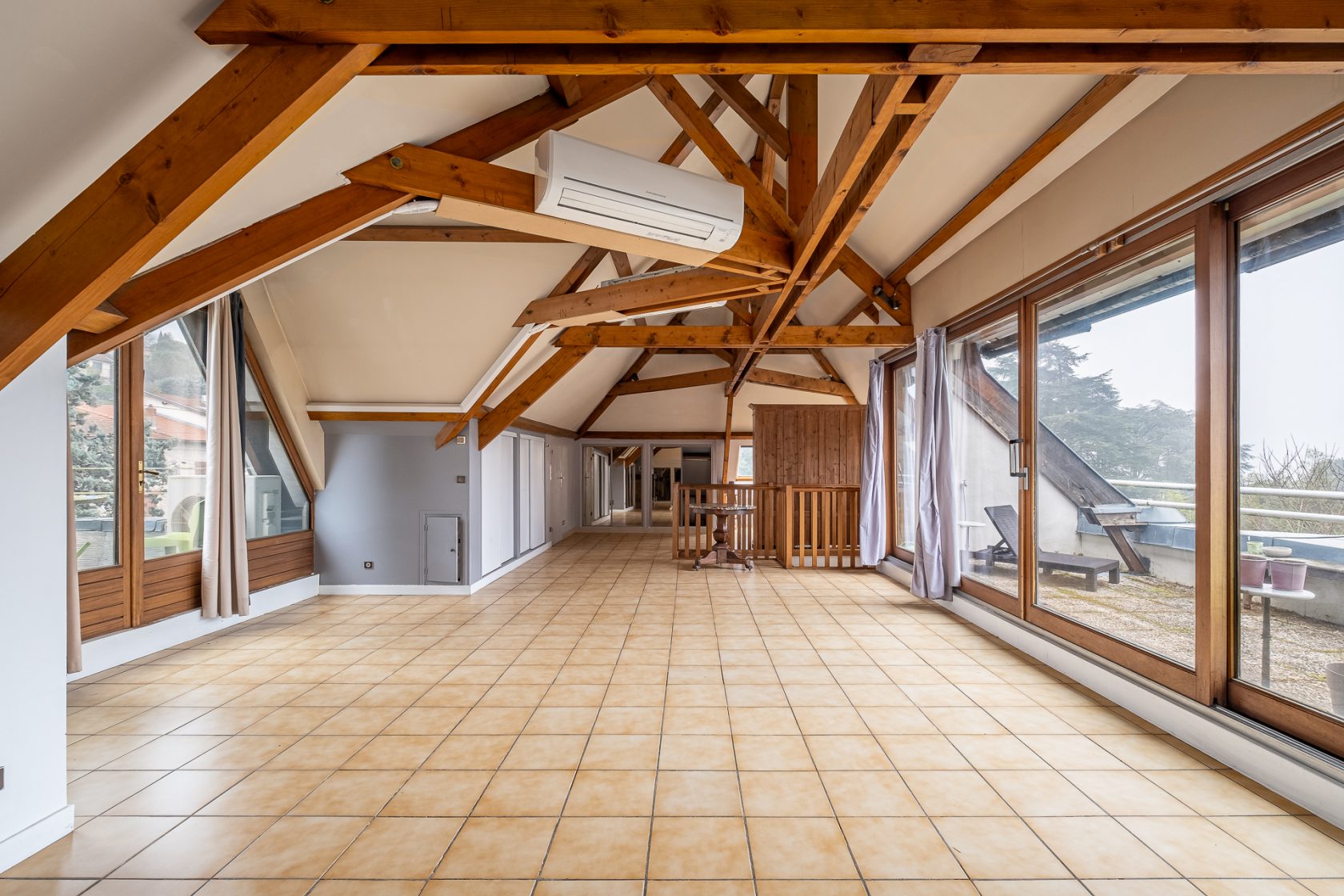 Loft en dernier étage d’une maison située au coeur d’un parc