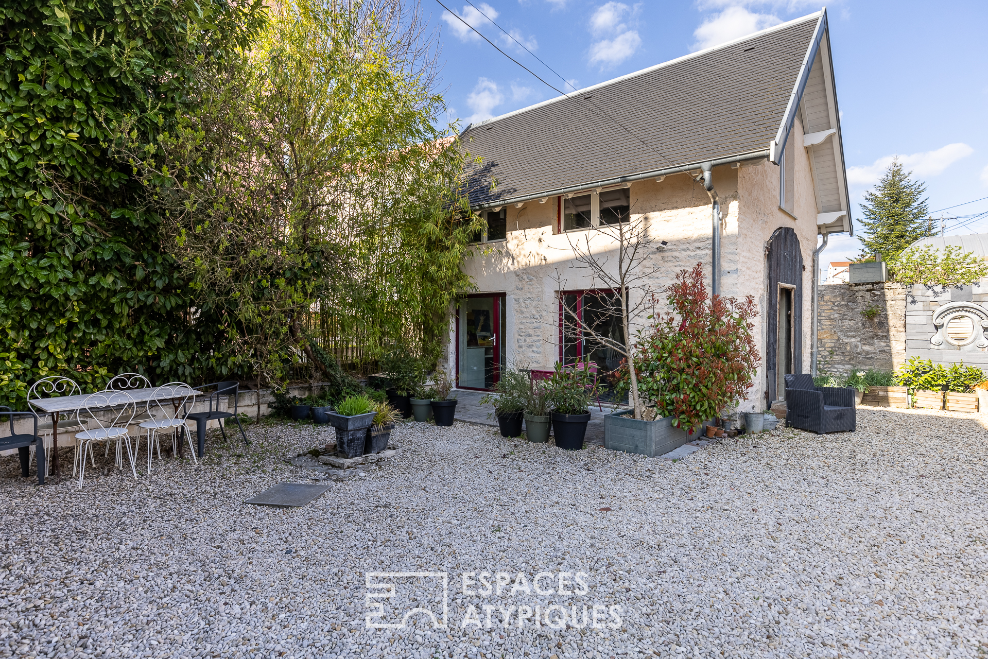 The old watchmaker’s house with its swimming pool and garden
