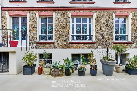 Ancienne salle de yoga esprit loft avec balcon