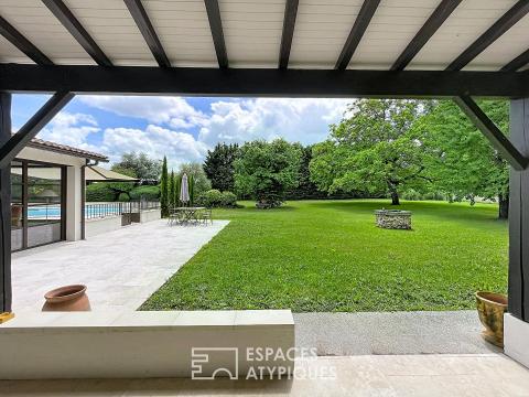Stone mansion with swimming pool and outbuilding