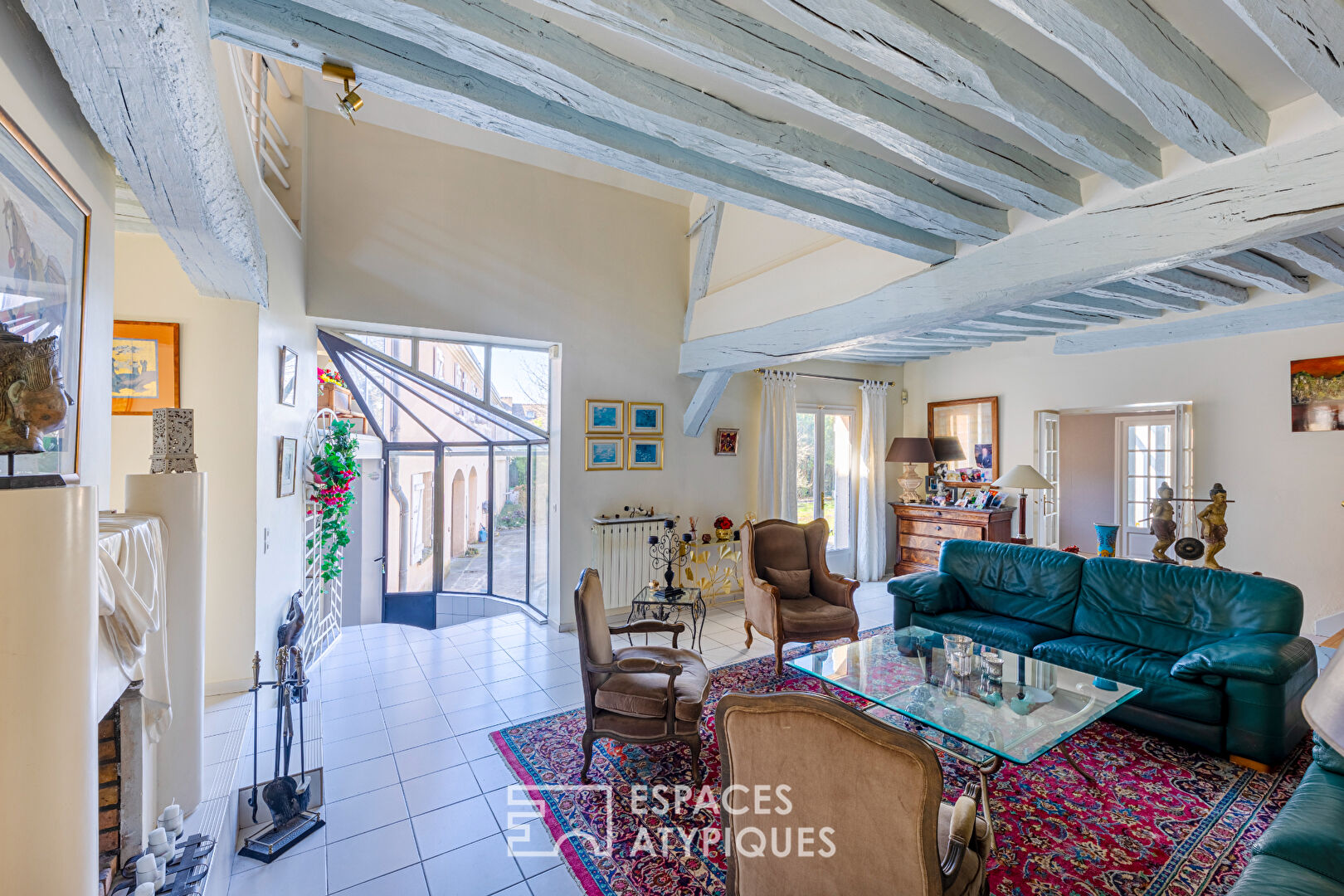 18th century farmhouse renovated into a family home with indoor swimming pool, terrace and garden in Attainville.