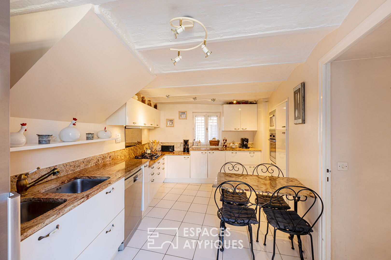 18th century farmhouse renovated into a family home with indoor swimming pool, terrace and garden in Attainville.