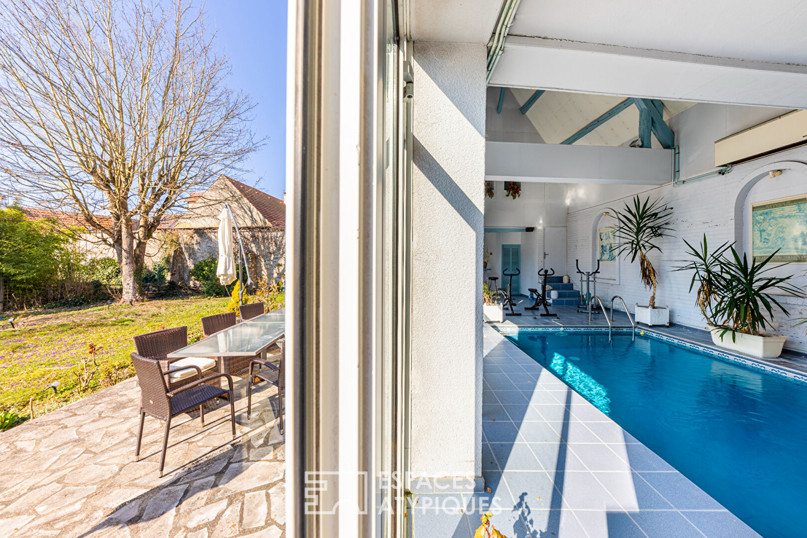 18th century farmhouse renovated into a family home with indoor swimming pool, terrace and garden in Attainville.