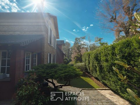 Maison meulière rénovée avec jardin et extensions dans un quartier recherché de Soisy-sur-Seine