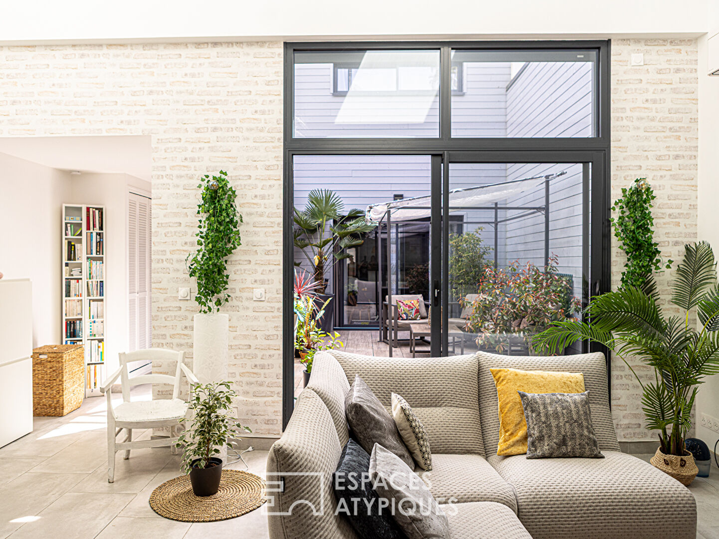 Contemporary duplex with patio