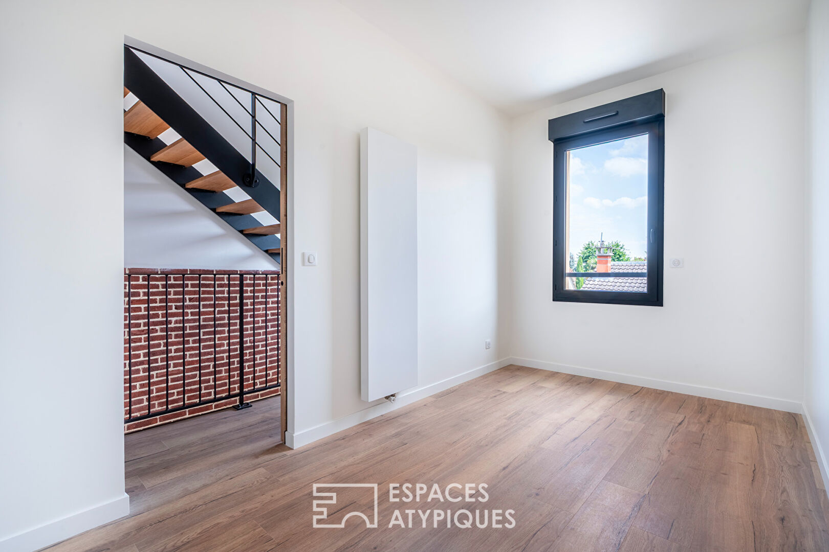 Maison d’architecte verticale avec vues sur Paris