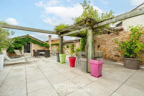 Golden stone house with roof terrace