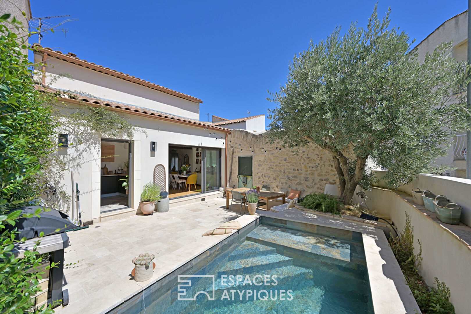 Renovated village house, private courtyard and amenities just a stone’s throw away