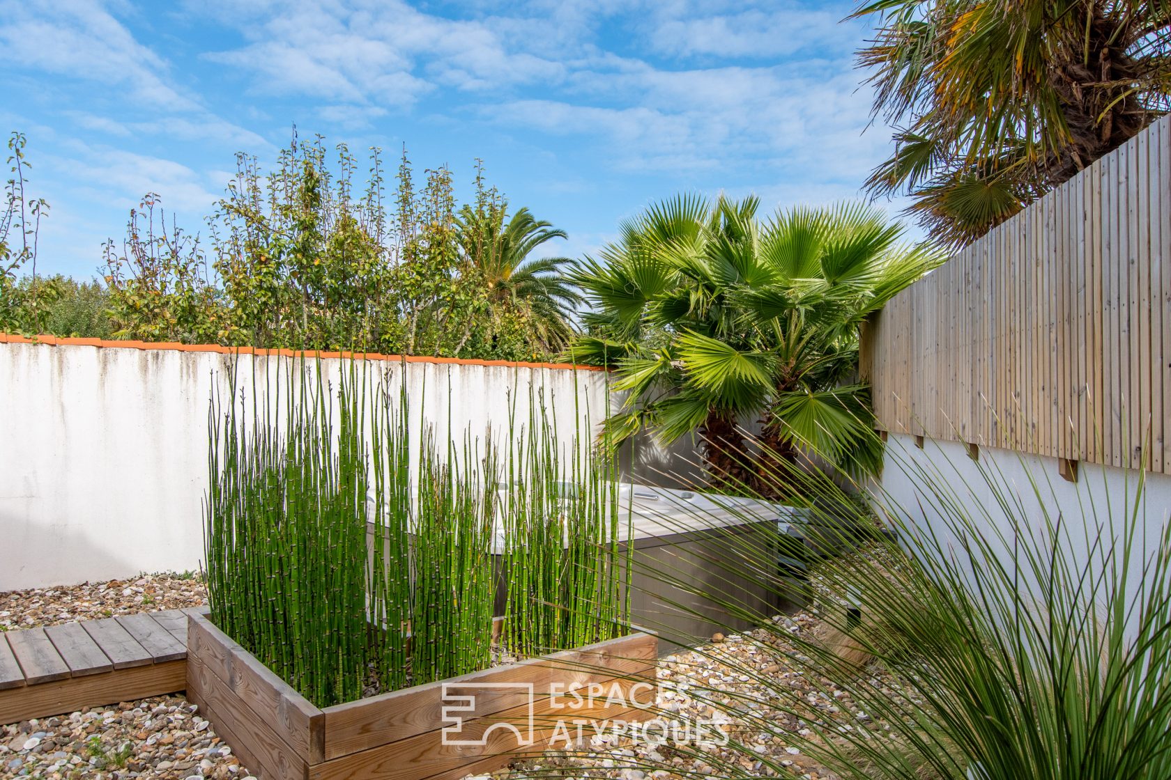 Architect house with terrace and garden by the sea