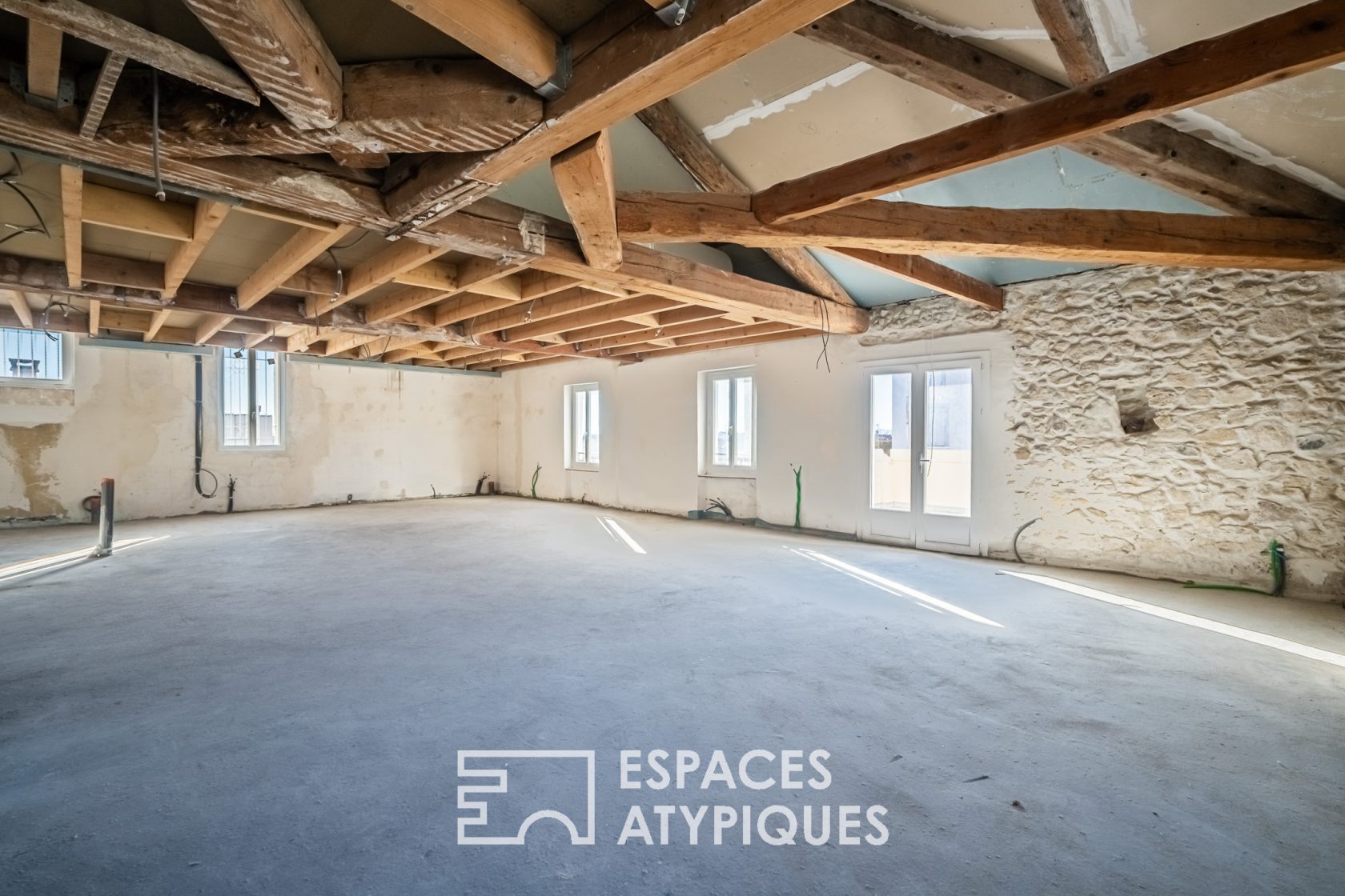 Bright and Quiet Loft with Rare Potential in Downtown Narbonne