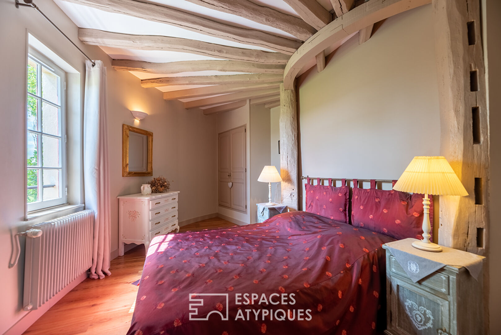 Old furnished mill in a green environment