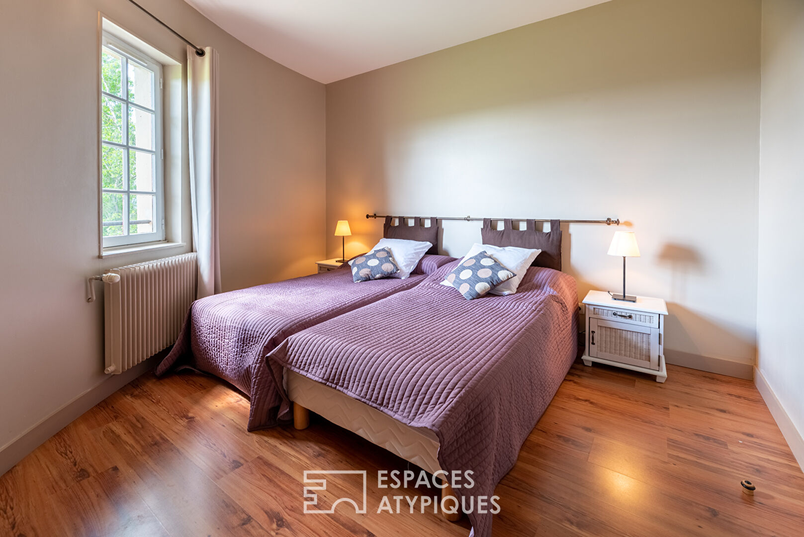 Old furnished mill in a green environment