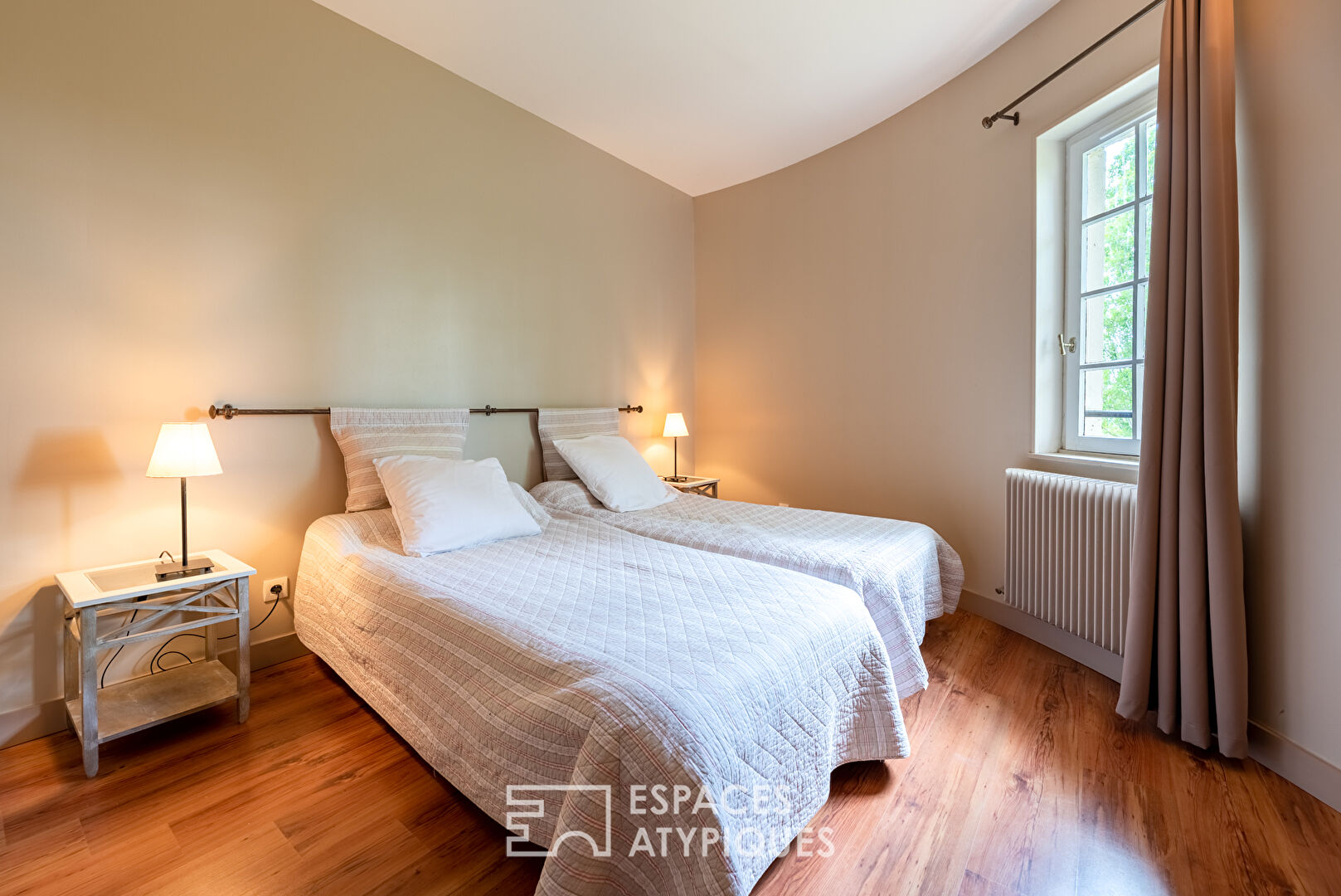 Old furnished mill in a green environment