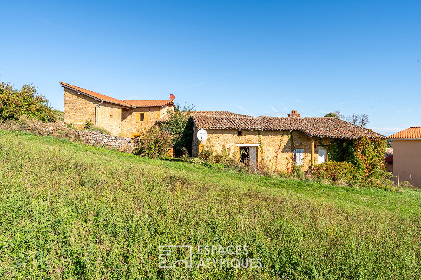 Golden stone house with great potential
