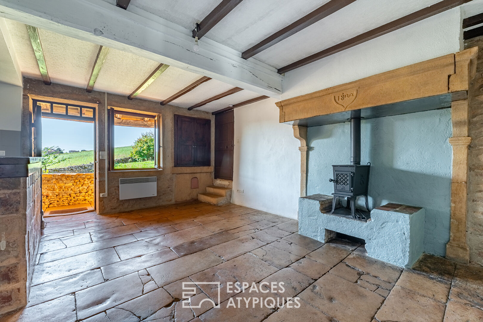 Golden stone house with great potential