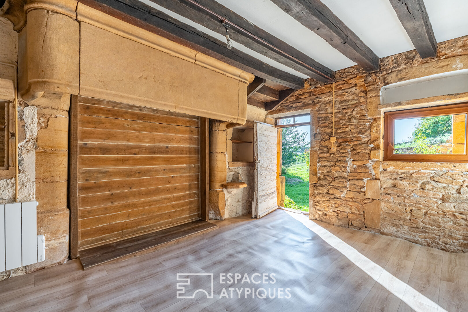 Golden stone house with great potential
