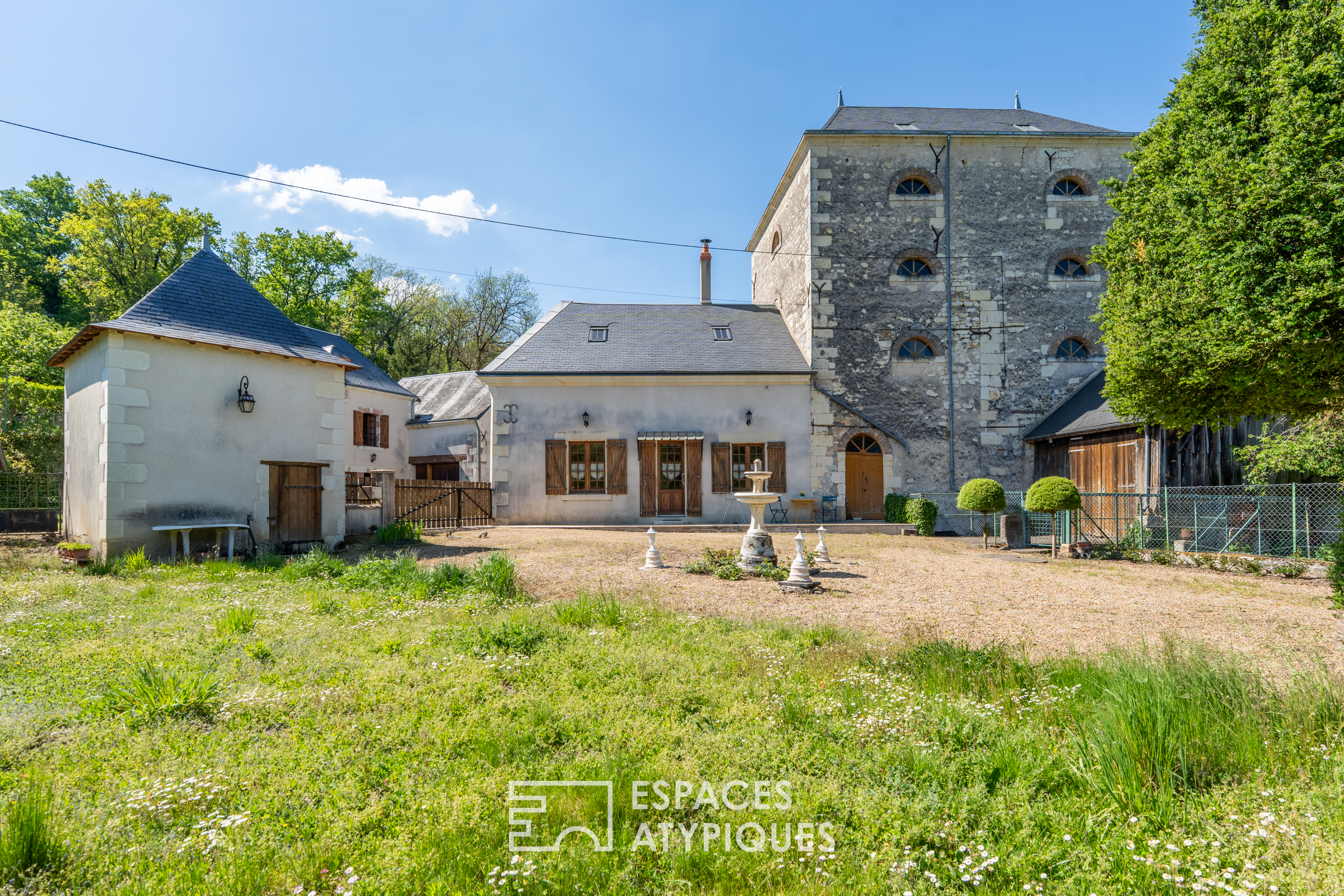 Historic mill and its outbuildings in the heart of nature