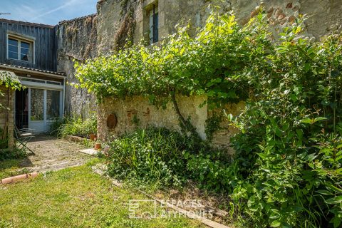 Ancienne épicerie transformée avec vue Garonne et jardin
