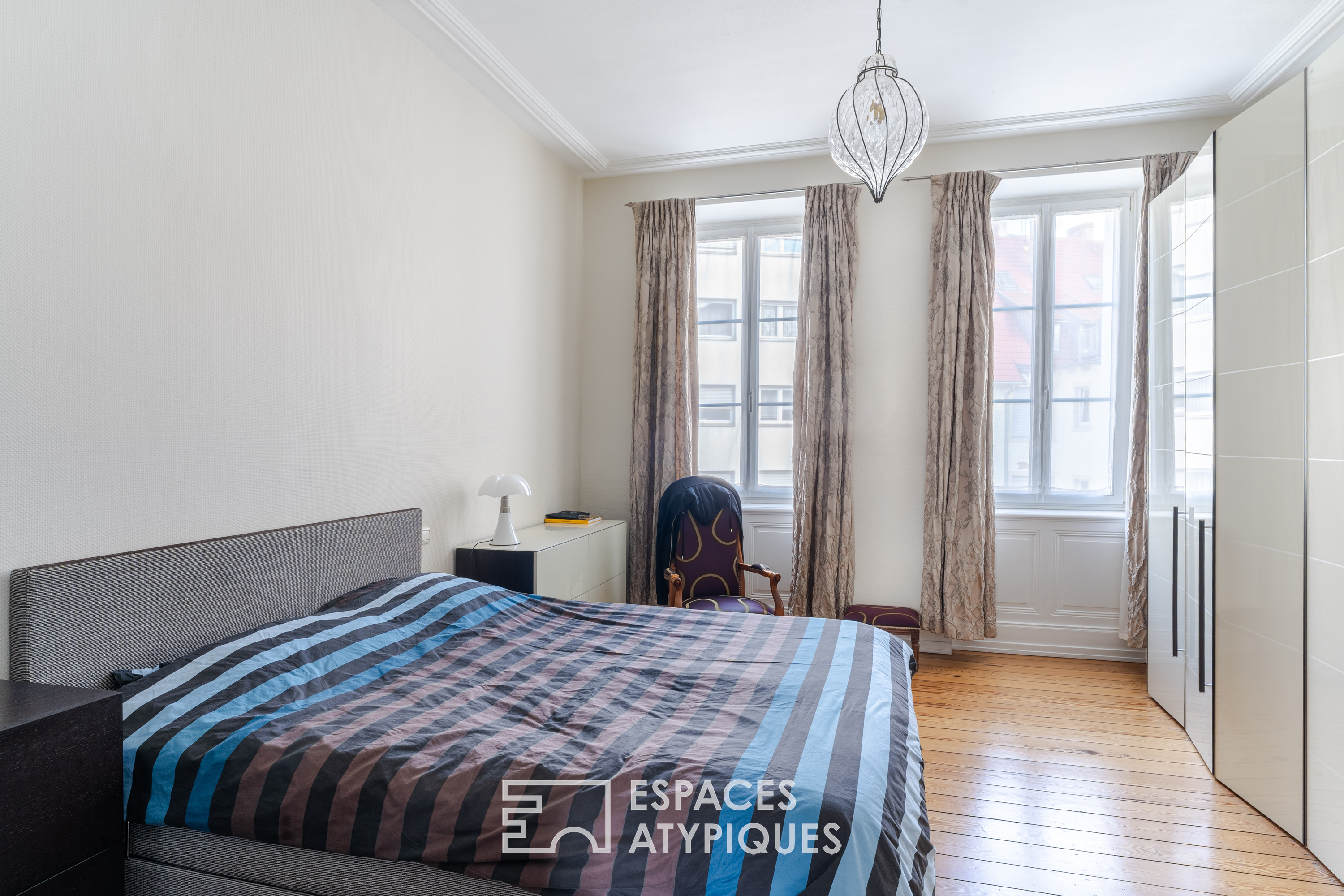 Appartement de caractère en étage élevé