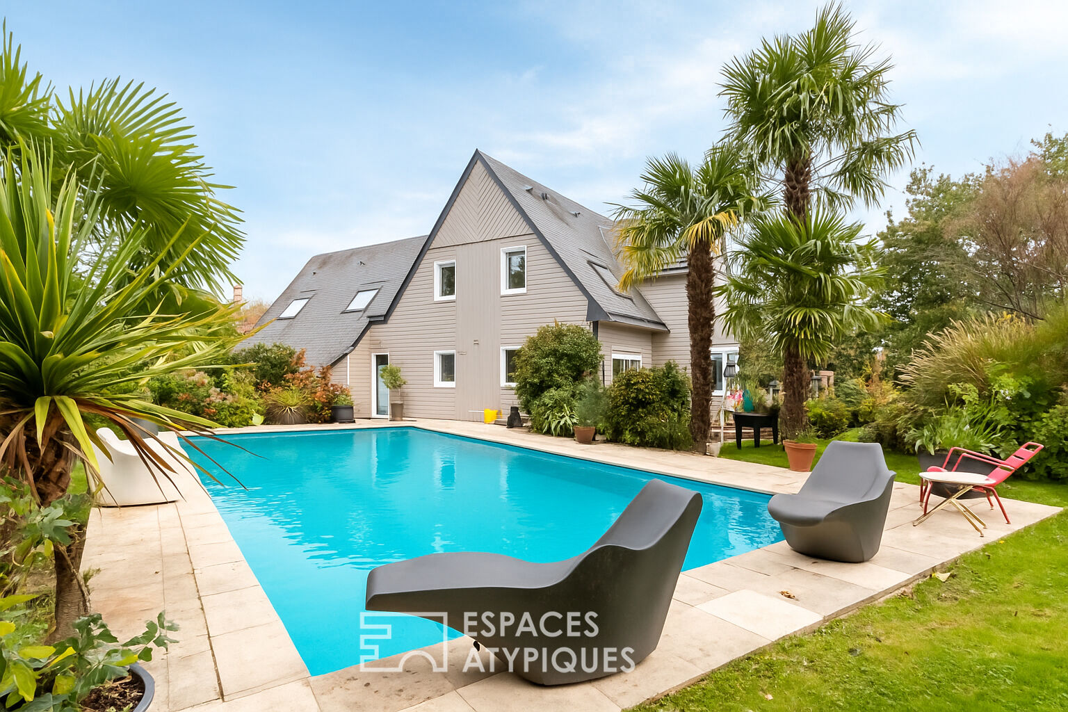 Contemporary Wooden Villa with Heated Pool and Panoramic Golf View