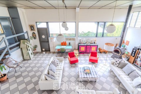 Ancien garage automobile transformé en loft à proximité de la gare de Carrières sur Seine