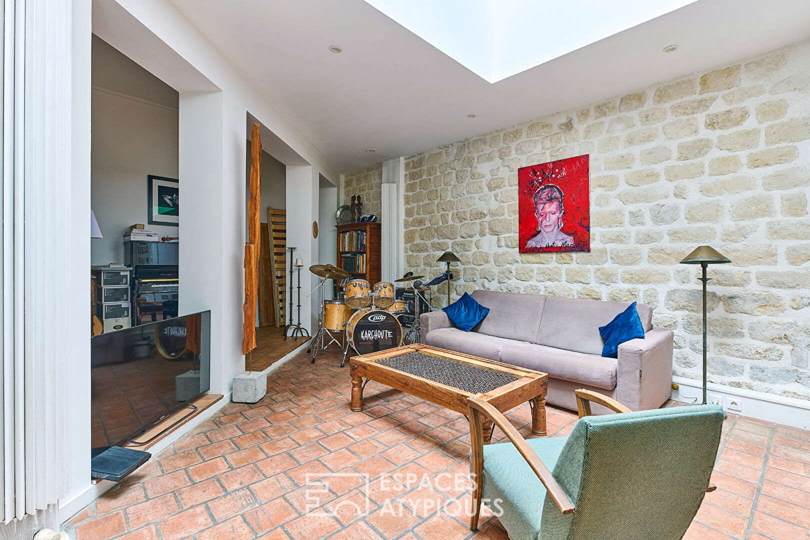 Triplex avec terrasse sur une cour végétalisée