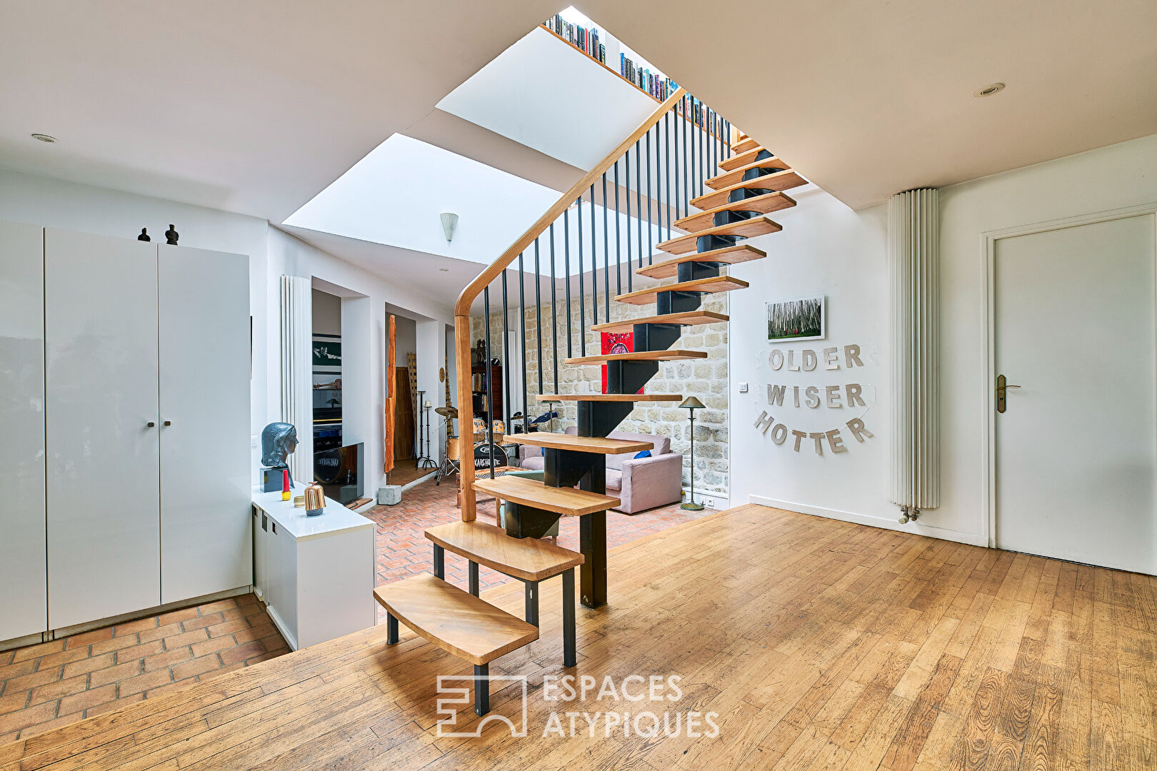 Triplex avec terrasse sur une cour végétalisée