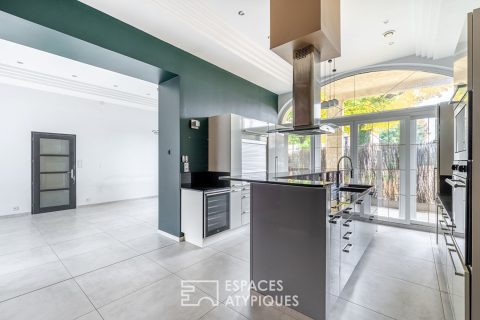 Appartement en rez-de-chaussée avec terrasse, stationnement et garage