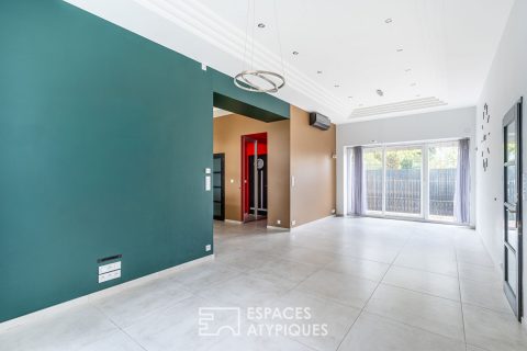 Appartement en rez-de-chaussée avec terrasse, stationnement et garage