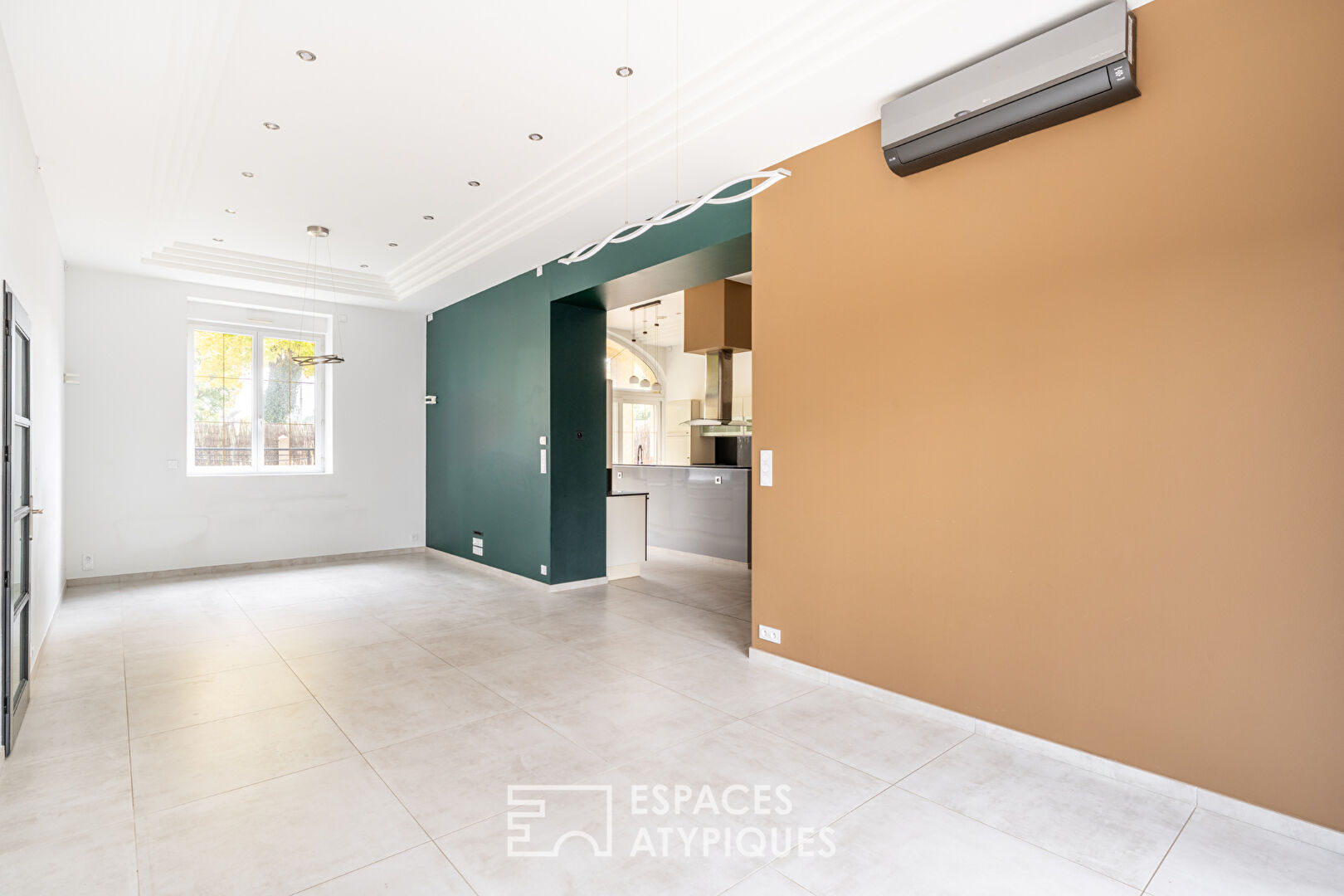 Appartement en rez-de-chaussée avec terrasse, stationnement et garage