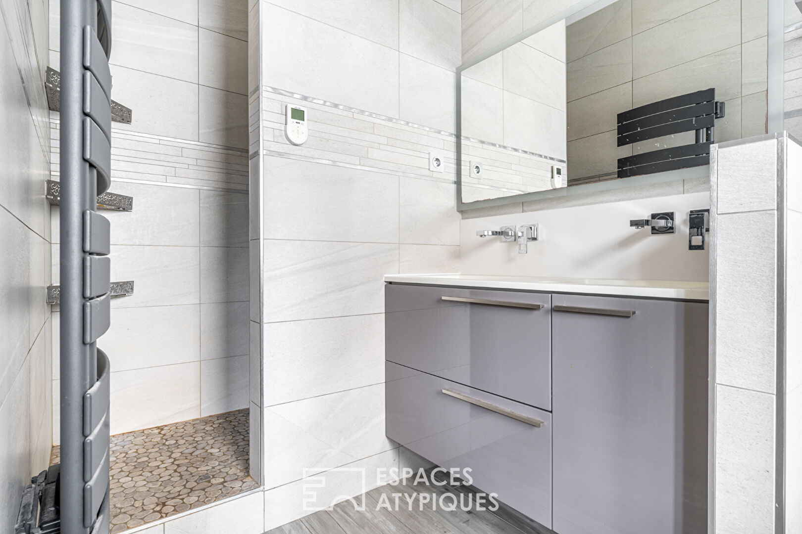 Appartement en rez-de-chaussée avec terrasse, stationnement et garage