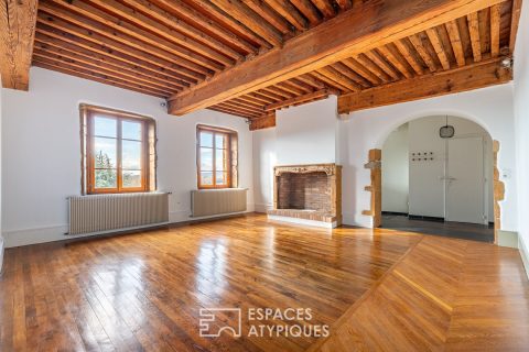 Charme historique et vue panoramique en dernier étage.