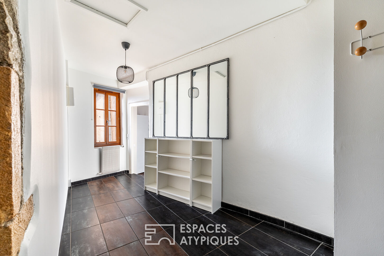 Charme historique et vue panoramique en dernier étage.