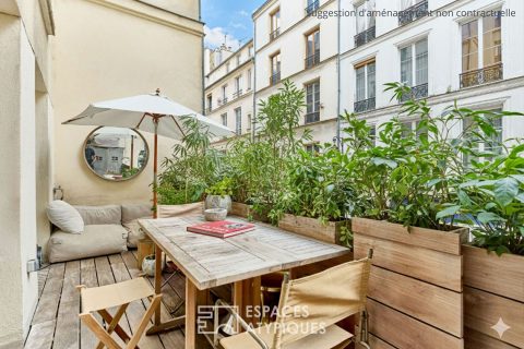 Appartement rénové avec terrasse au coeur du quartier des enfants rouges