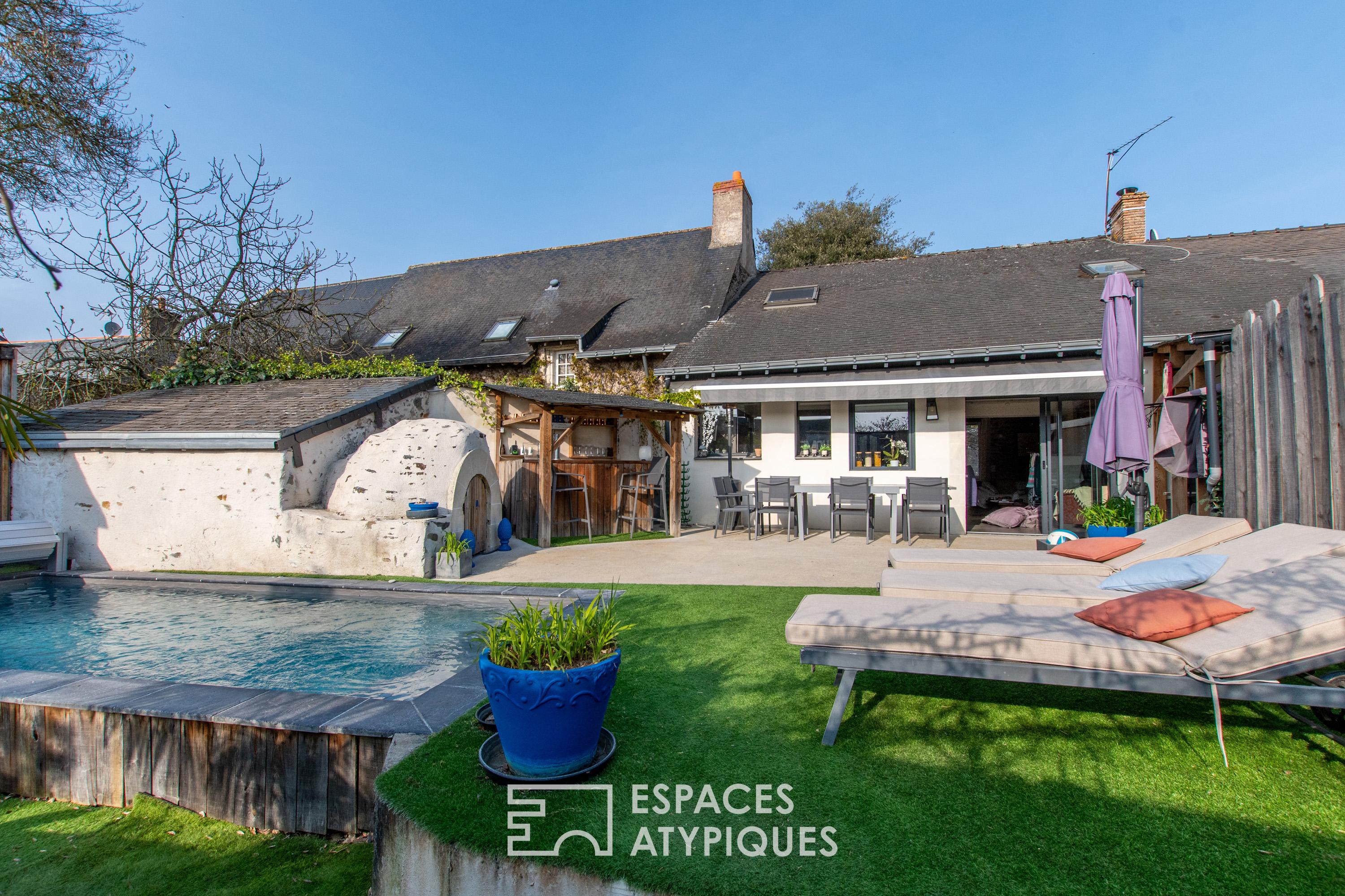 Charming house with a recently built swimming pool in its verdant setting