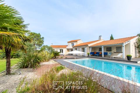 Propriété avec piscine dans son parc paysagé