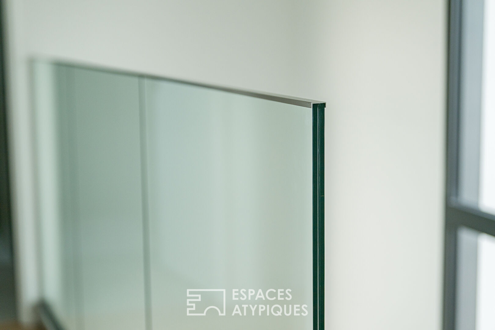 Contemporary flat-roofed house with swimming pool and garage