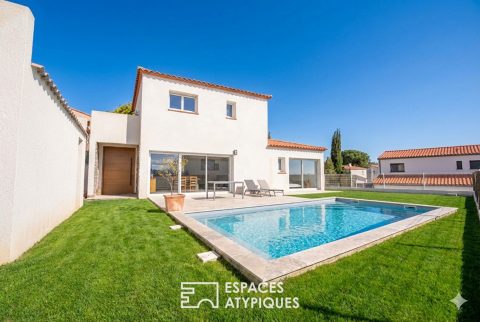 Villa récente avec jardin, un écrin récent aux accents de pierre à proximité de Perpignan