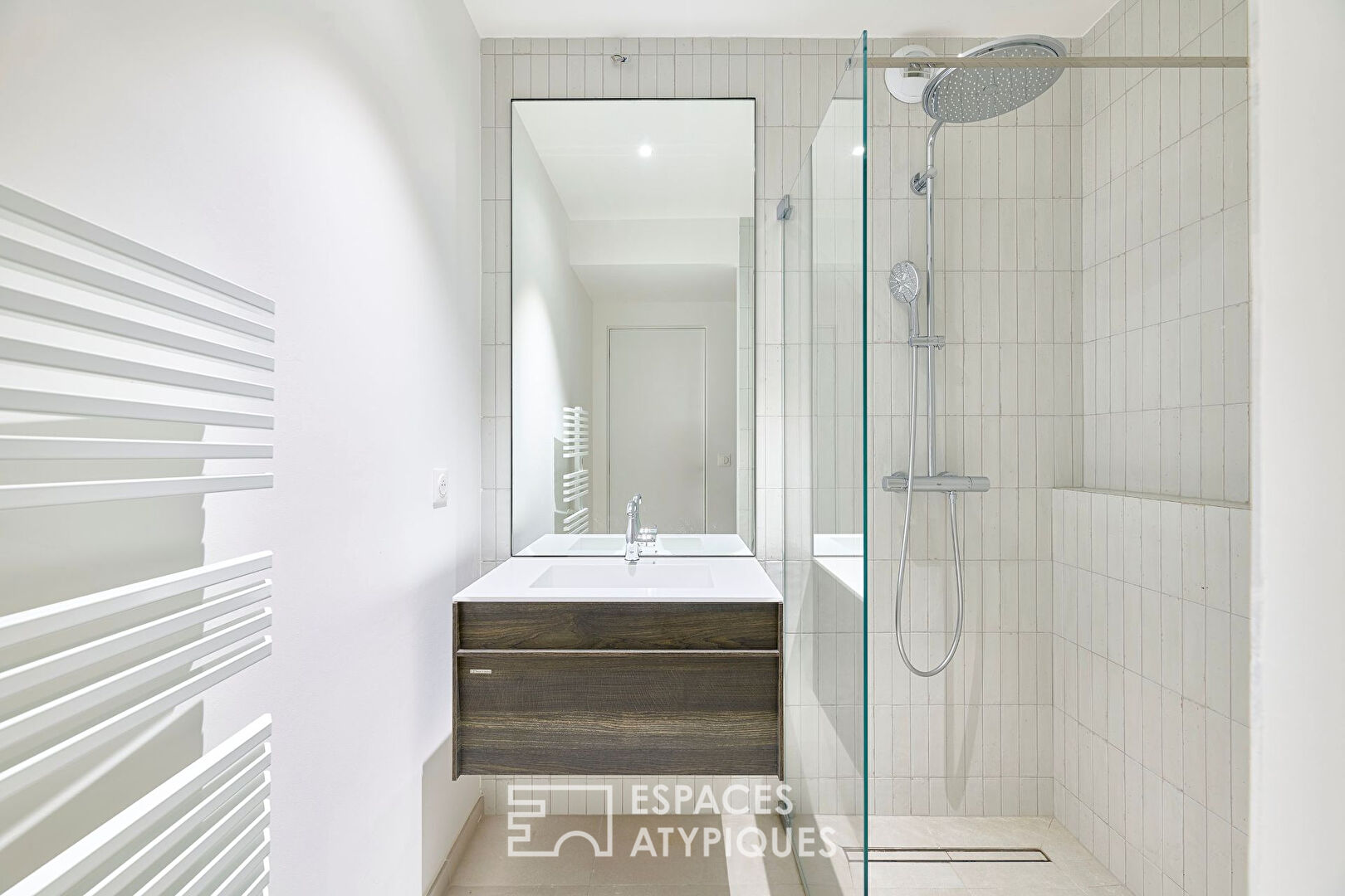 Appartement à l&rsquo;esprit atelier proche de la Place des Vosges